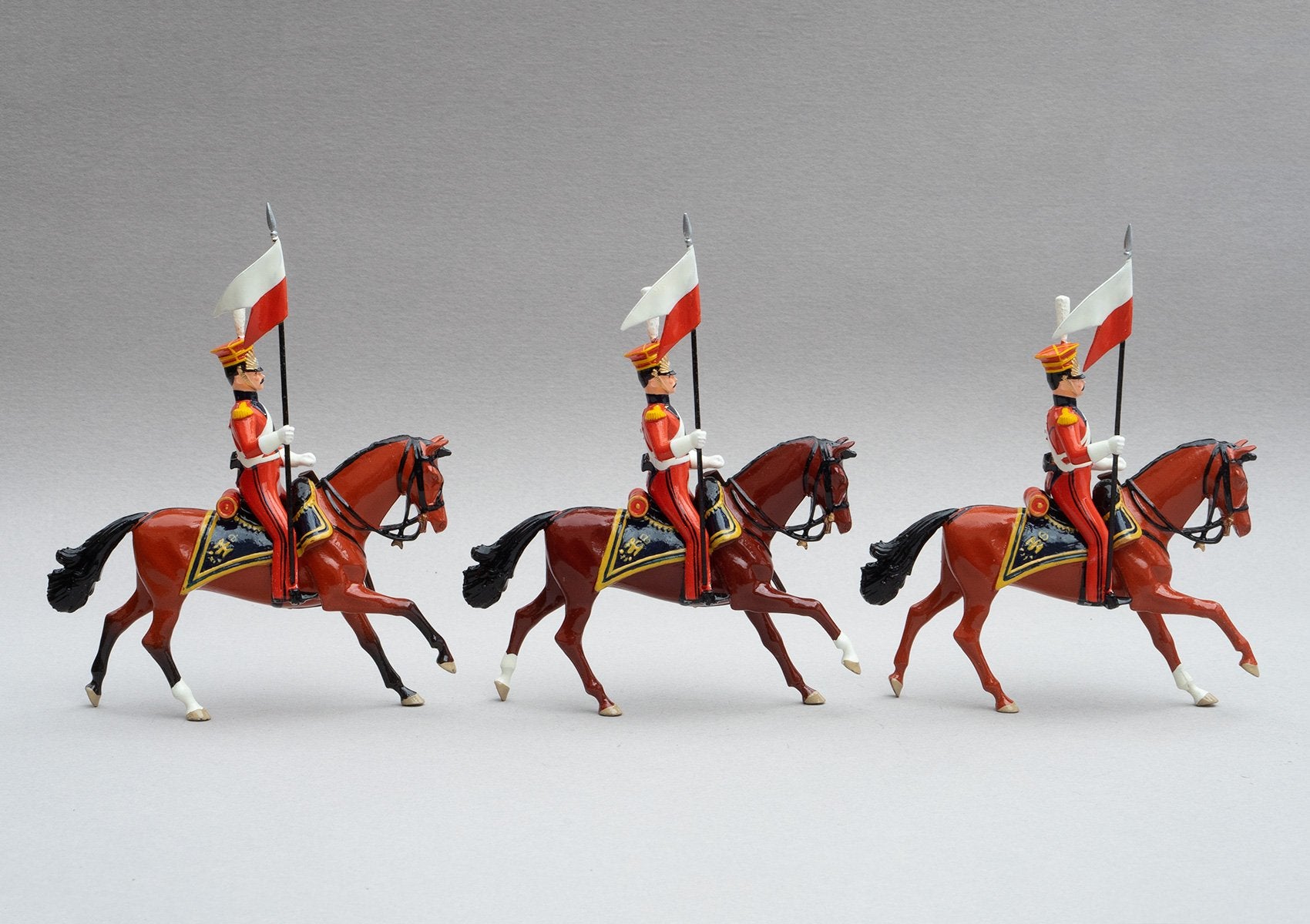 Set 105 Dutch Lancers | Cavalry | Napoleonic Wars | Three Dutch Lancers dressed in orange uniform with lances adorned with red and white pennants | Waterloo | © Imperial Productions | Sculpt by David Cowe