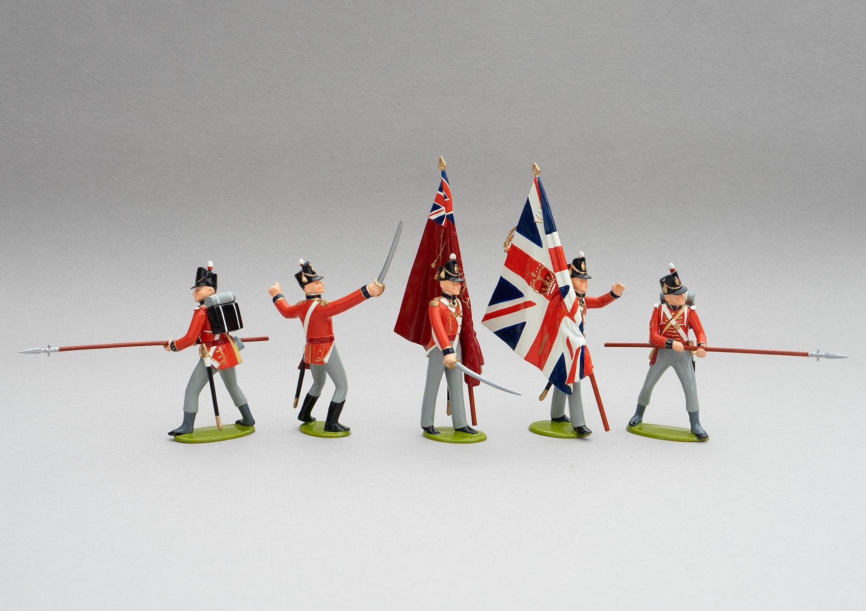 Set 139 1st Foot Guards Colour Party, Waterloo 1815 | British Infantry | Napoleonic Wars | Colour party; two ensigns with colours, two guards with pikes, and an officer with sabre drawn | Waterloo | © Imperial Productions | Sculpt by David Cowe