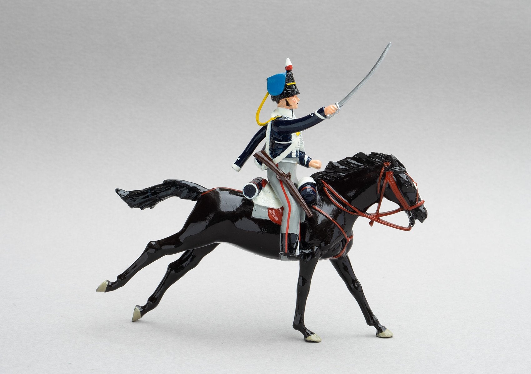 Set 148 18th Hussars, 1815 | British Cavalry | Napoleonic Wars | Single mounted cavalry trooper with rifle and sabre. Black fur cap with blue bag, and dark blue jacket with white looping | Waterloo | © Imperial Productions | Sculpt by David Cowe