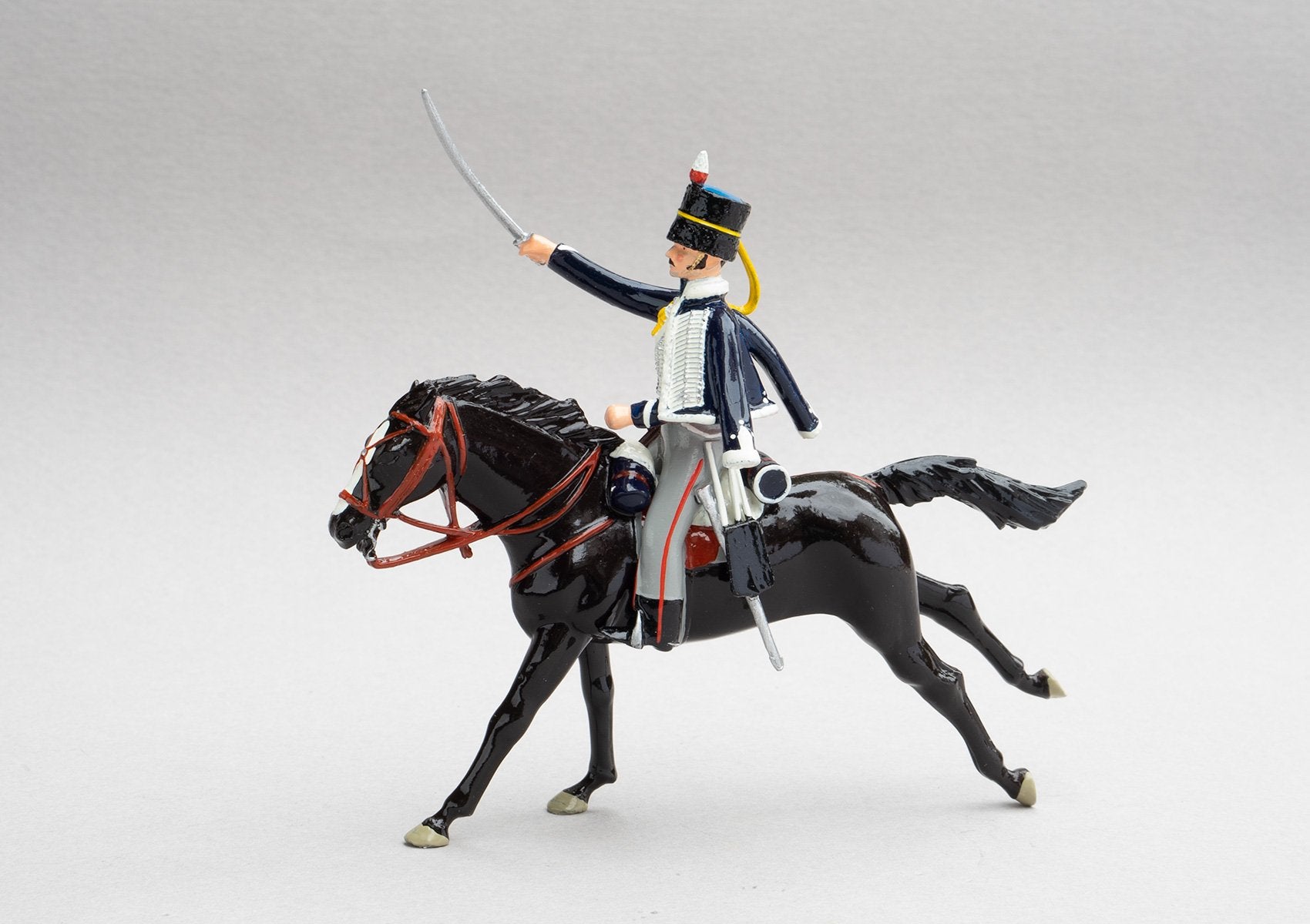 Set 148 18th Hussars, 1815 | British Cavalry | Napoleonic Wars | Single mounted cavalry trooper with rifle and sabre. Black fur cap with blue bag, and dark blue jacket with white looping | Waterloo | © Imperial Productions | Sculpt by David Cowe