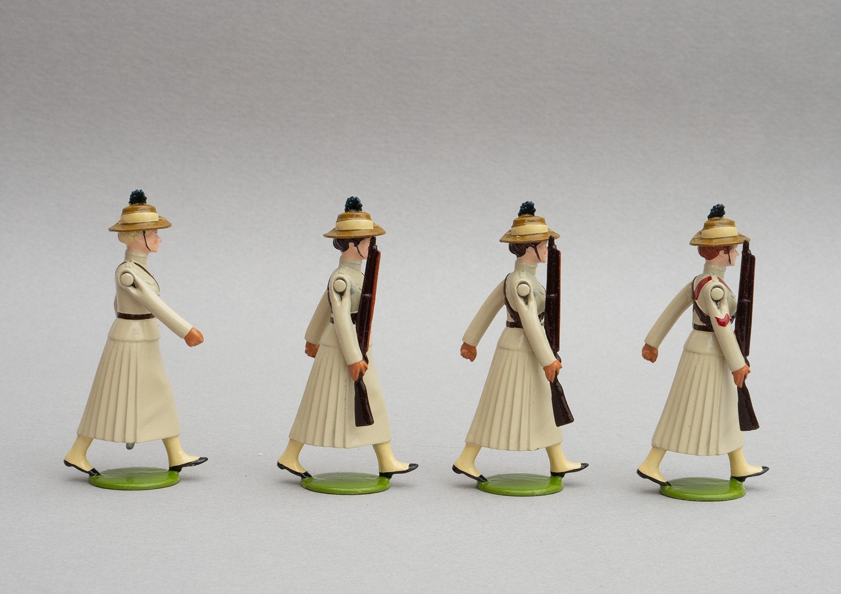 Set NZ1 Girls' Khaki Brigade, Boer War | NZ | New Zealand | Set of four women marching | Boer War | © Imperial Productions | Sculpt by David Cowe