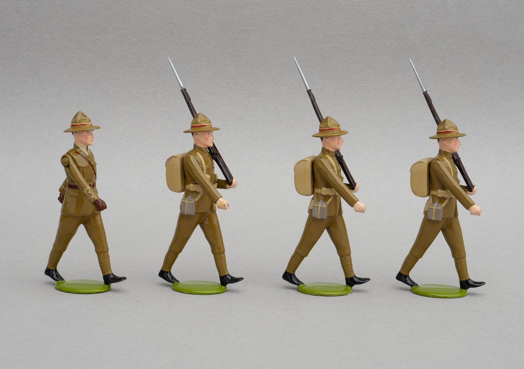 Set NZ4 NZ Infantry, France WWI | NZ Infantry | New Zealand | Set of four men, one officer, three men marching | WW1, Somme, Ypres, Arras, Western Front, Messines, Broodseinde, Passchendaele, Bapaume, Le Quesnoy | © Imperial Productions | Sculpt by David Cowe