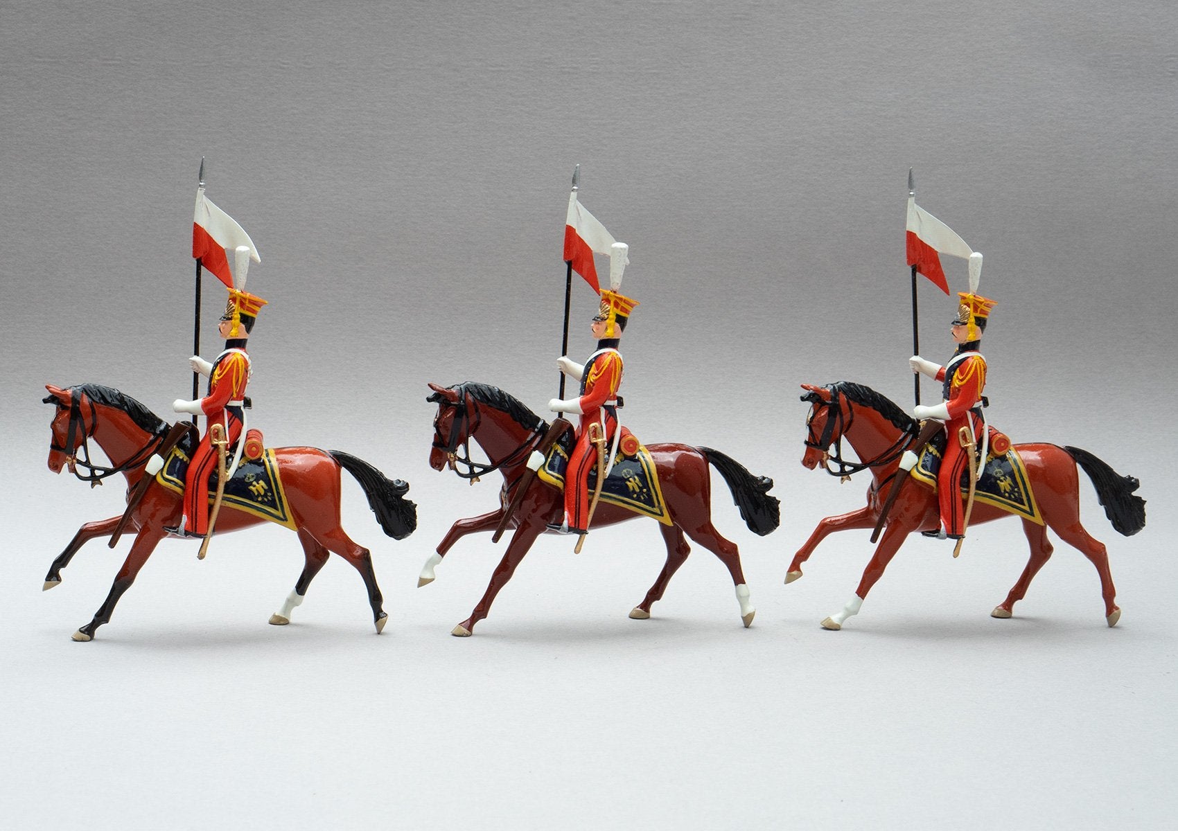 Set 105 Dutch Lancers | Cavalry | Napoleonic Wars | Three Dutch Lancers dressed in orange uniform with lances adorned with red and white pennants | Waterloo | © Imperial Productions | Sculpt by David Cowe