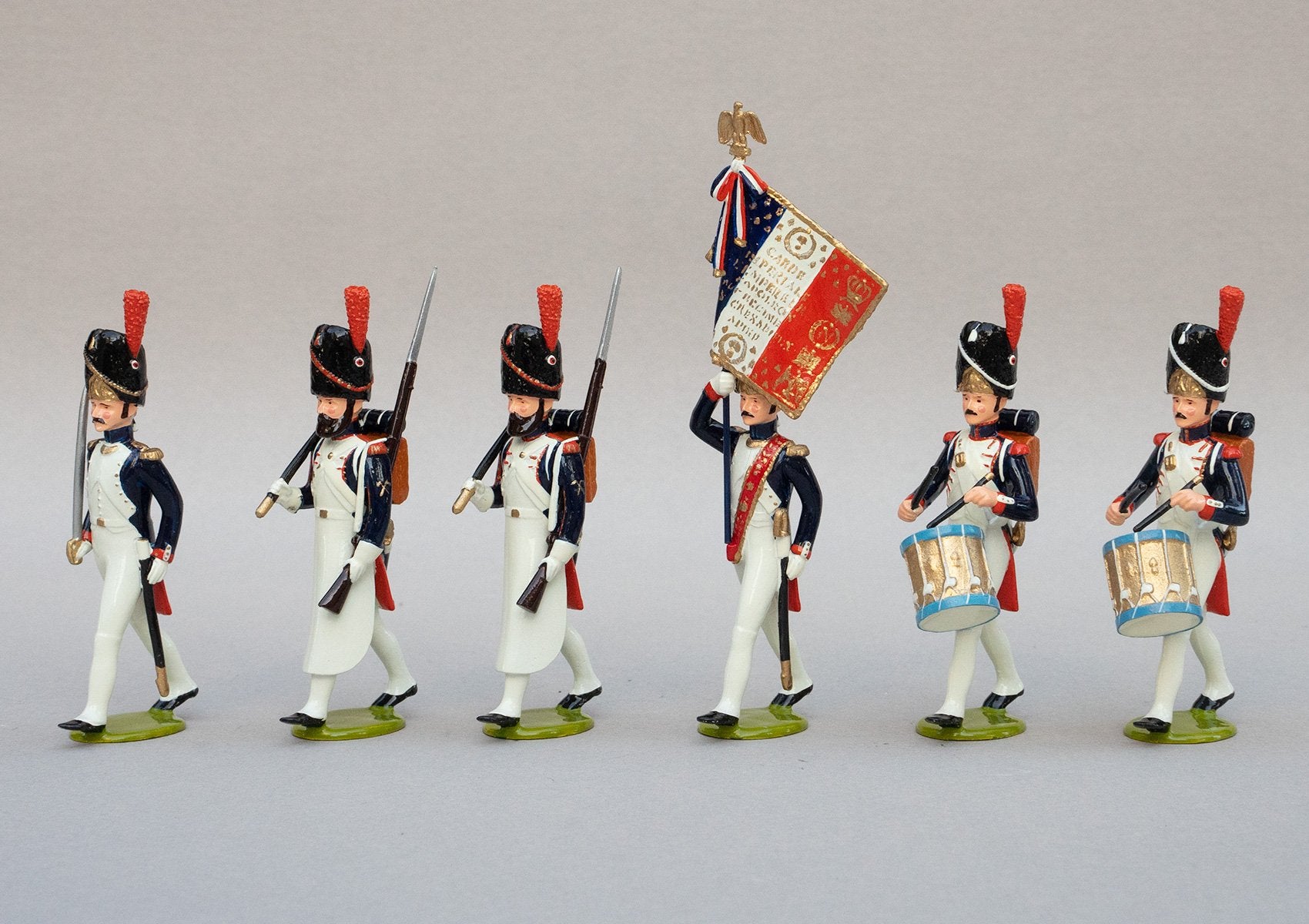 Set 110 Grenadiers à Pied, Head of Column, 1st Empire | French Infantry | Napoleonic Wars | Set of six men, one officer with sword, one ensign with colours and battle honours, two drummers and two pioneers marching | Waterloo | © Imperial Productions | Sculpt by David Cowe