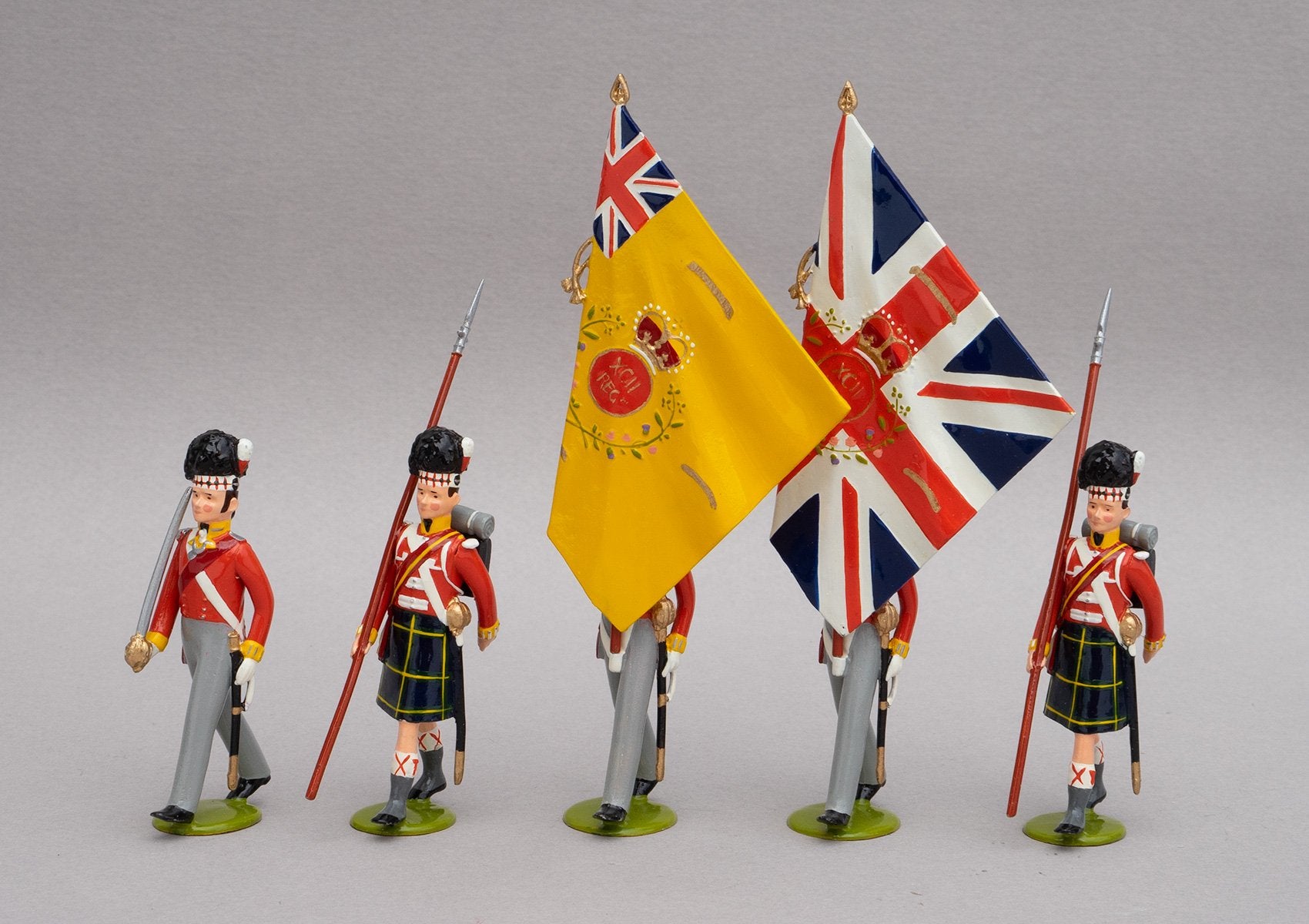 Set 122 Colour Party Gordon Highlanders, Waterloo 1815 | British Infantry | Napoleonic Wars | Colour Party; All wear the Highlander feather bonnet and Gordon tartan kilts. This set comprises a two ensigns carrying the colours, two guards, and one officer | Waterloo | © Imperial Productions | Sculpt by David Cowe