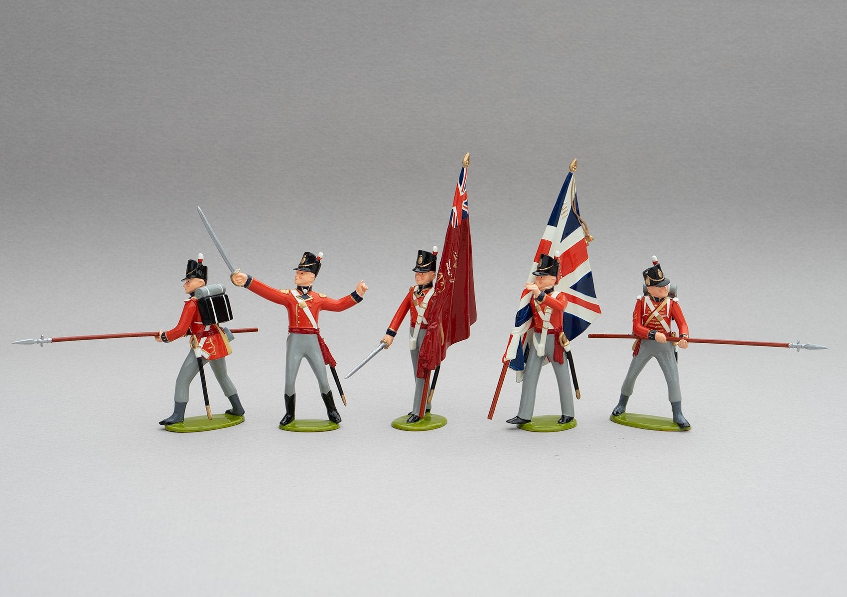Set 139 1st Foot Guards Colour Party, Waterloo 1815 | British Infantry | Napoleonic Wars | Colour party; two ensigns with colours, two guards with pikes, and an officer with sabre drawn | Waterloo | © Imperial Productions | Sculpt by David Cowe