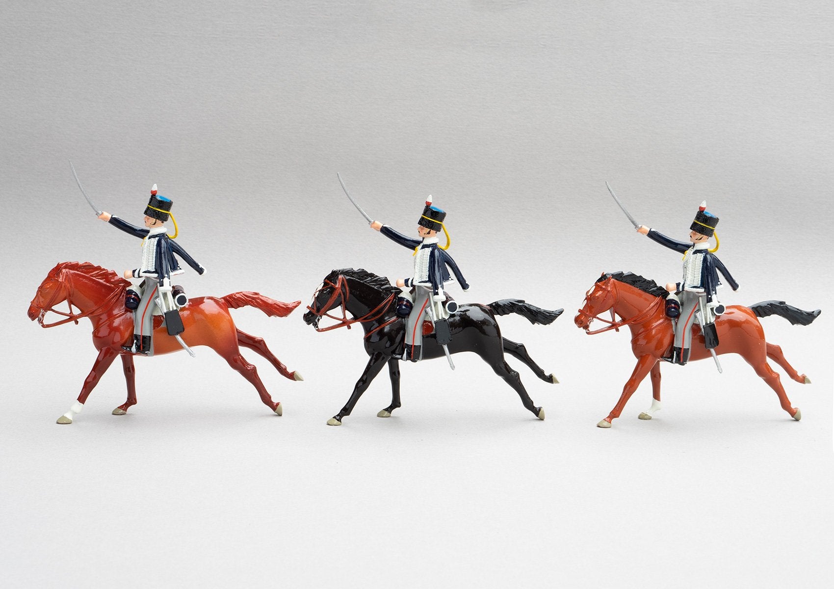 Set 148 18th Hussars, 1815 | British Cavalry | Napoleonic Wars | Three mounted cavalry troopers with rifles and sabres. Black fur caps with blue bags, and dark blue jacket with white looping | Waterloo | © Imperial Productions | Sculpt by David Cowe